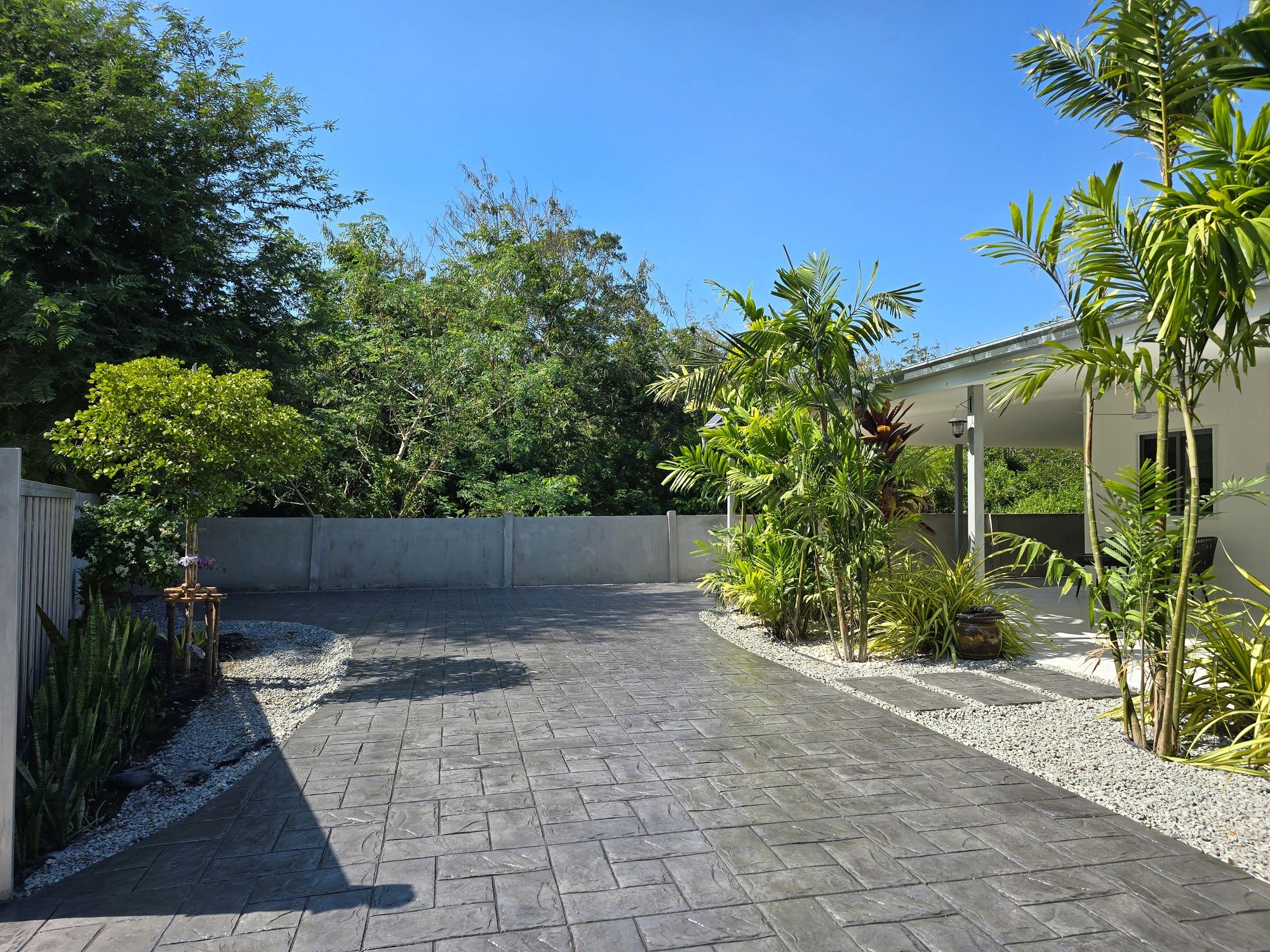 Completed concrete driveway with smooth finish